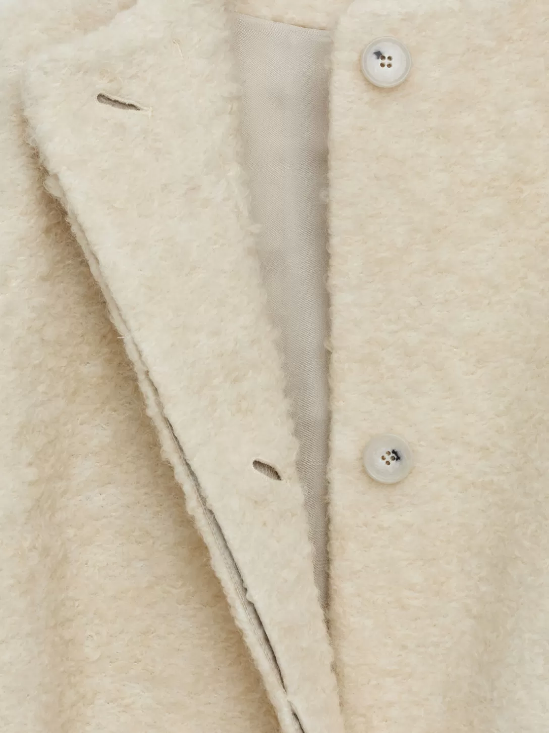 Giacca in Bouclé ARKET | Cappotti Oversize e Giacconi in Lana Merino | Stile Scandinavo Moderno con Design Minimalista | Abbigliamento Outdoor Comodo con Cappuccio Regolabile
