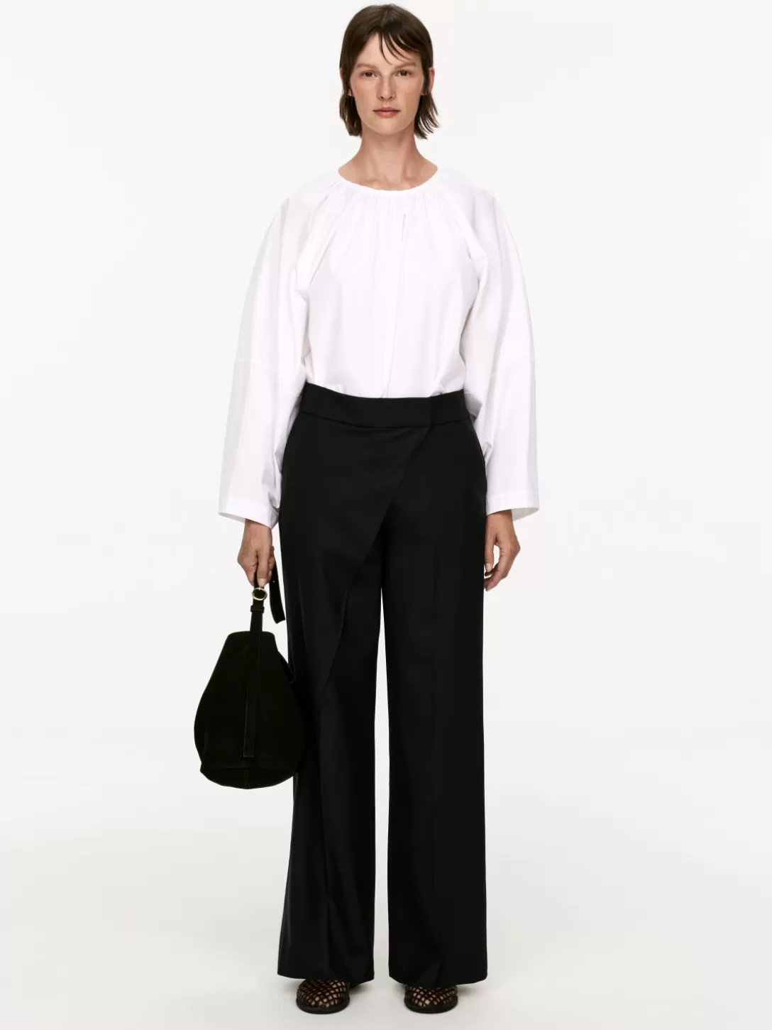 Pantaloni ARKET con design circolare - Taglio comodo e stile contemporaneo